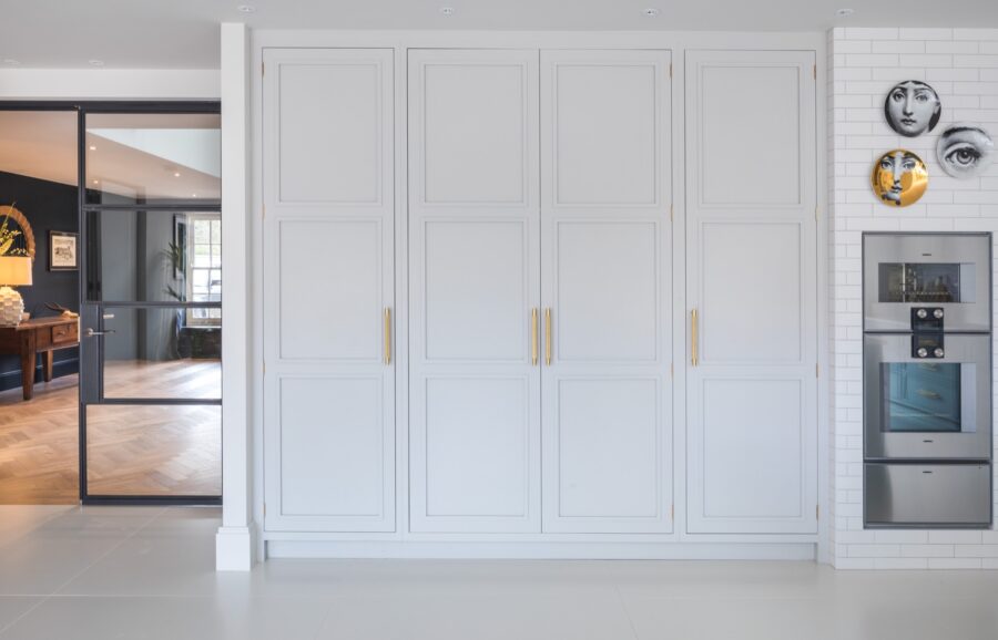 Tall bespoke kitchen cabinets closed