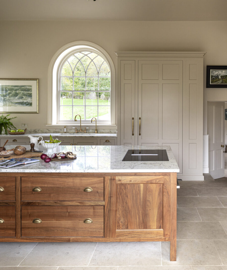 The timeless pallet of natural wood with pale cabinets offer some of the best colours for country house kitchens