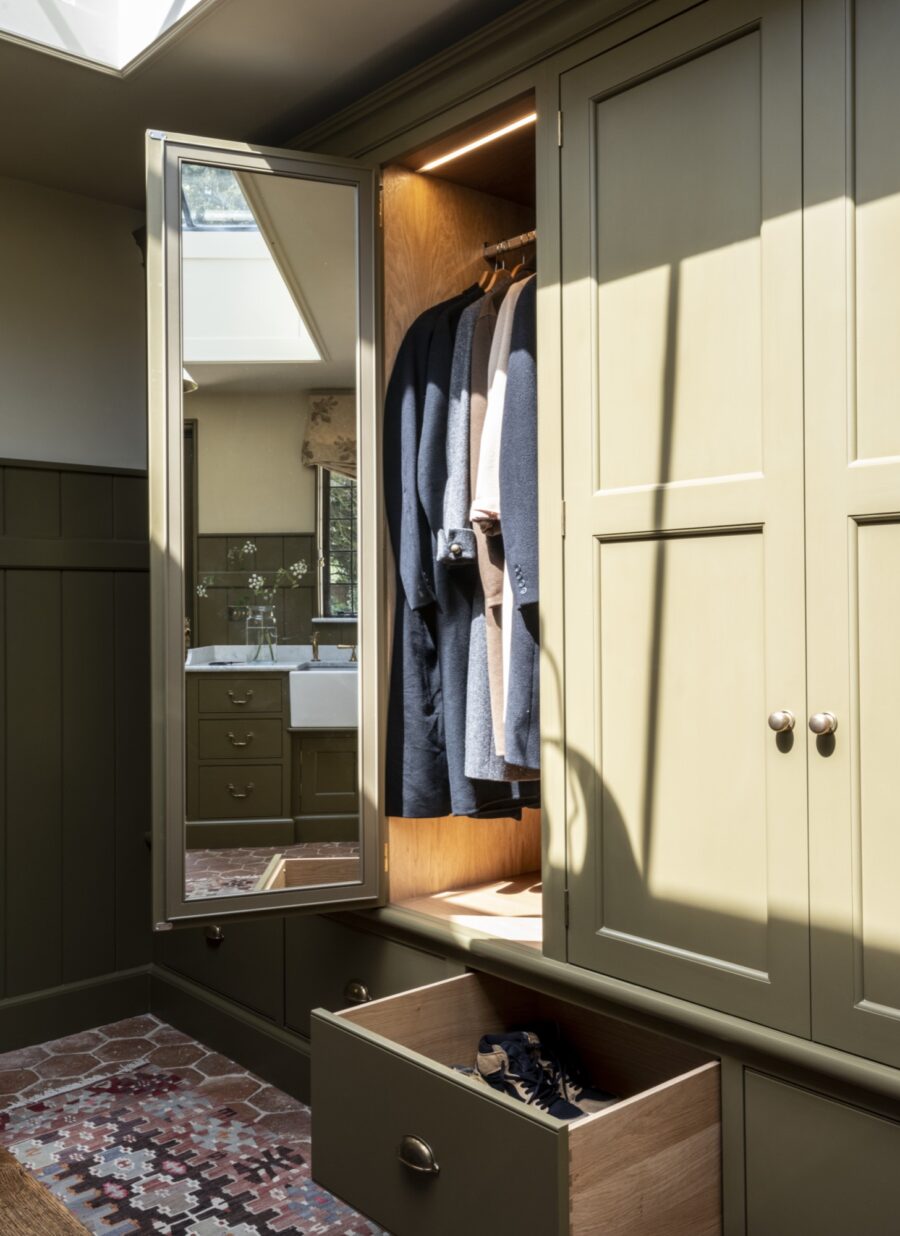 An open cupboard in a country house boot room